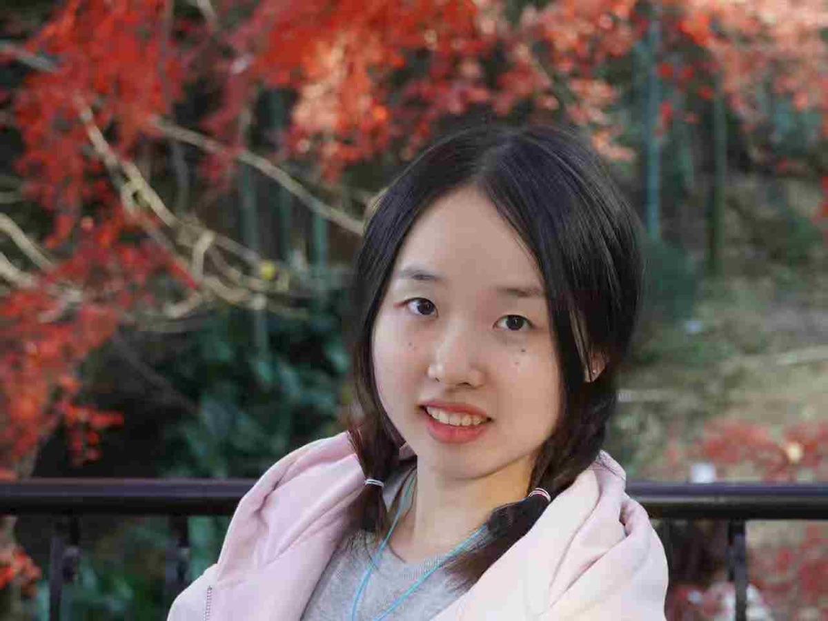 Yusha Tan in autumn scenery
